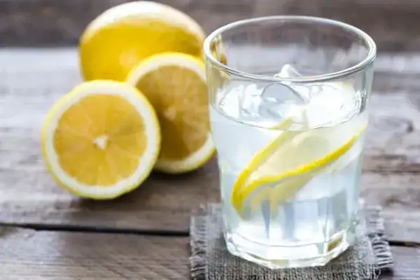 Hydration: The Secret Ingredient for a Toned Stomach and Enhanced Fitness 2 Image of lemon water to aid hydration Rugby